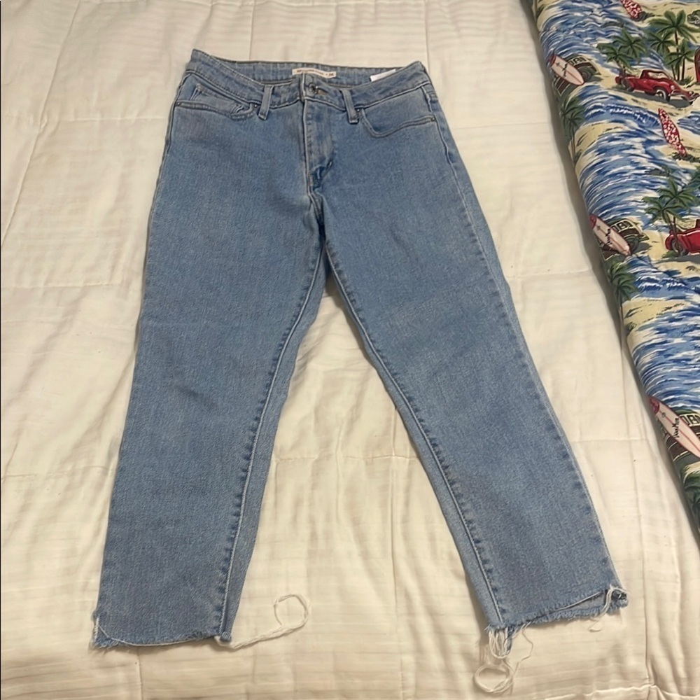 Leviβs 721 light wash high rise skinny jeans size 26